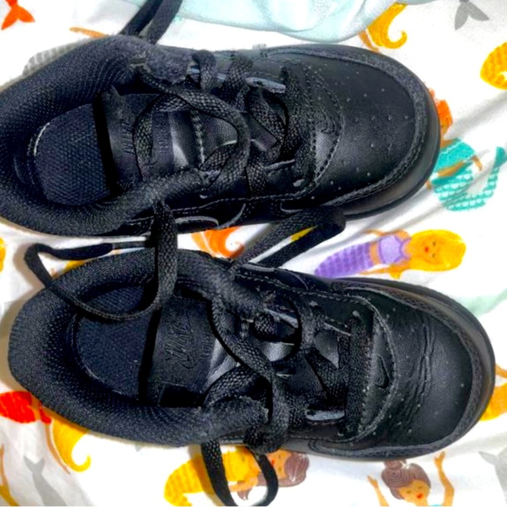 Nike Air Forces size 8C.